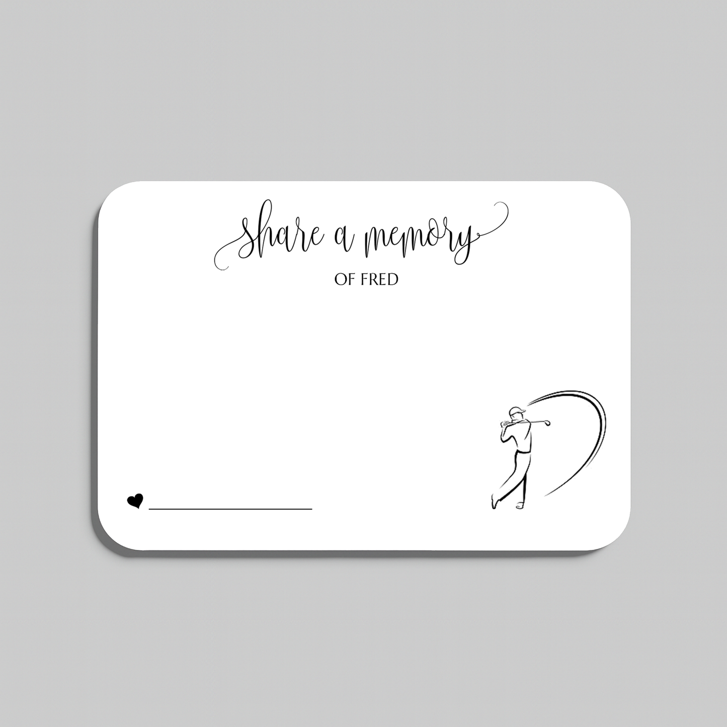A white rectangular memorial card with rounded corners, featuring the printed text 'share a memory' in black script and serif fonts, along with a simple black line drawing of a person holding a golf club. The card is shown on a light gray background.