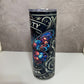 Tumbler with butterfly design and text on a gray background