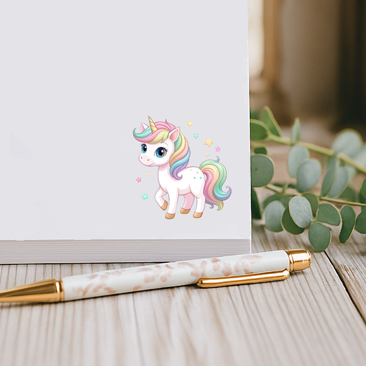 Fun and playful unicorn notepad with pastel rainbow design, perfect for kids, teens, and whimsical stationery lovers
