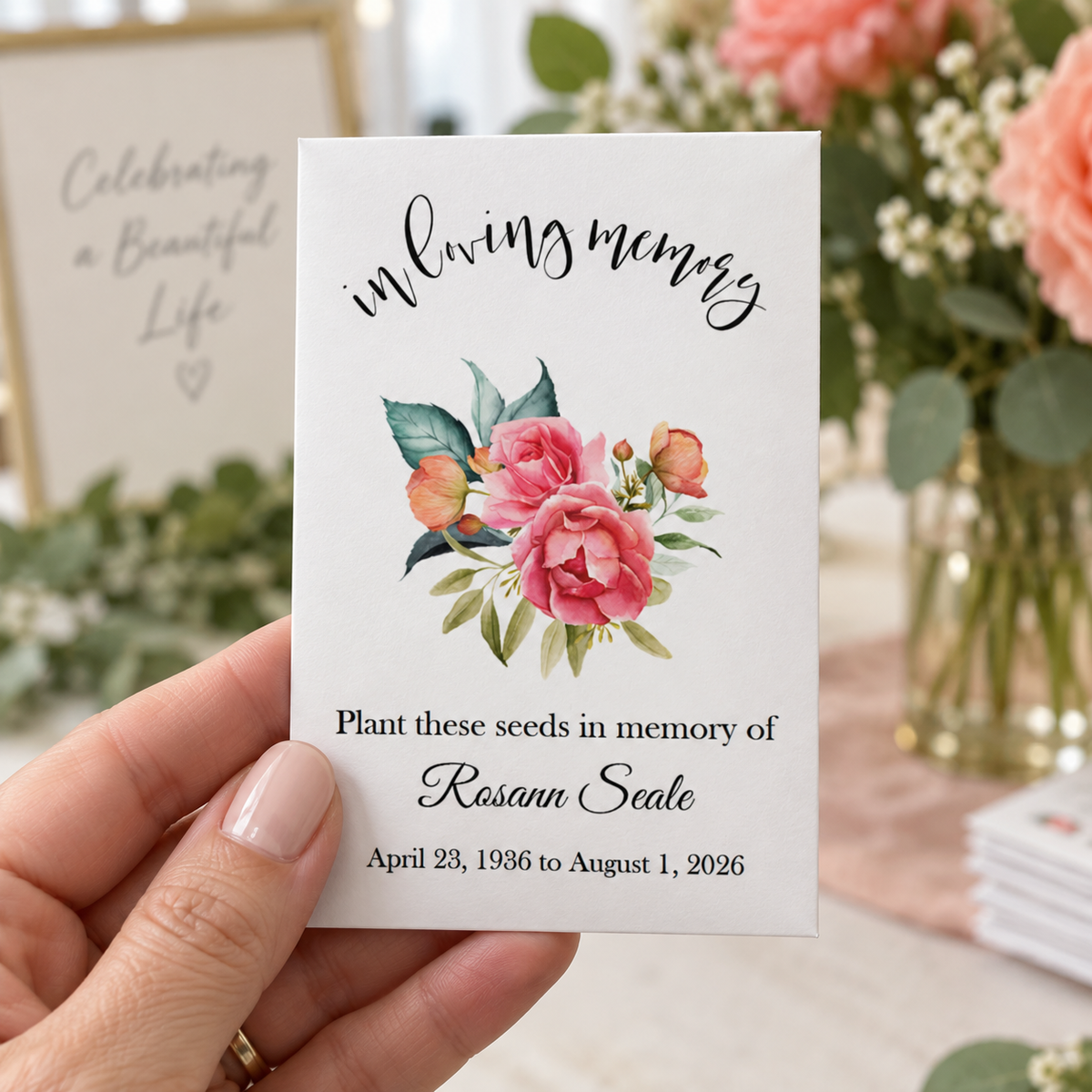 Personalized tropical floral memorial seed packet filled with forget-me-not seeds for a funeral or celebration of life