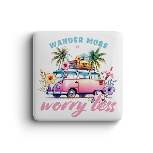 Pink retro van magnet with tropical flowers and palm trees, text Wander More Worry Less