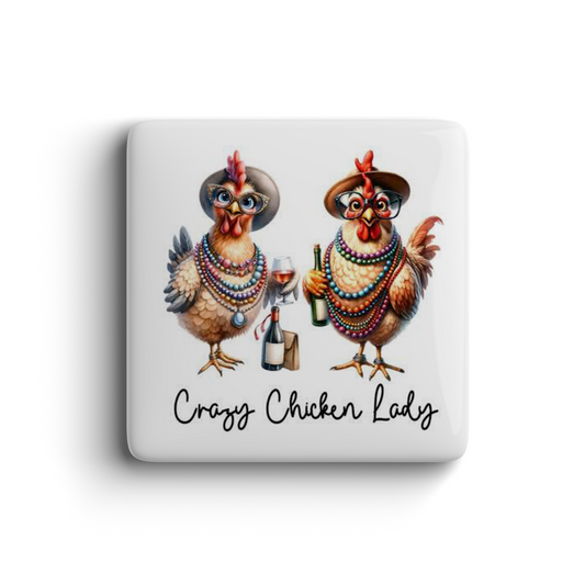 Funny Crazy Chicken Lady magnet with two chickens wearing hats, beads, and holding wine and champagne bottles