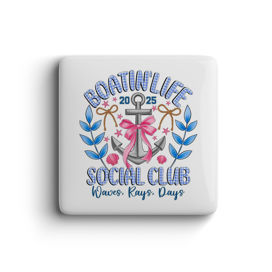 Fun square magnet with anchor, pink bow, blue leaves, and nautical text Boatin’ Life Social Club 2025