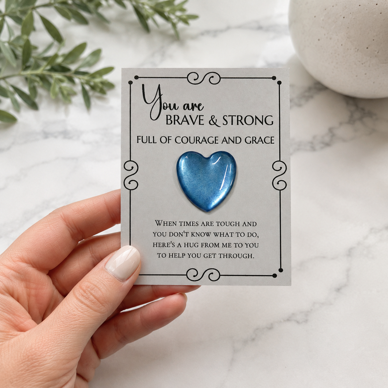 Inspirational pocket hug keepsake with a heart-shaped token on a "You Are Brave & Strong" encouragement card, a thoughtful comfort gift for friends, family, coworkers, or anyone needing support. Blue