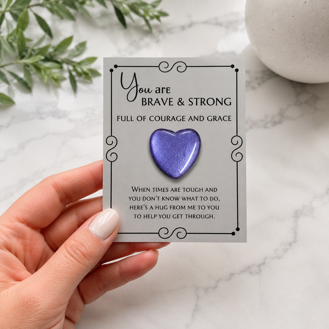 Inspirational pocket hug keepsake with a heart-shaped token on a "You Are Brave & Strong" encouragement card, a thoughtful comfort gift for friends, family, coworkers, or anyone needing support. Purple