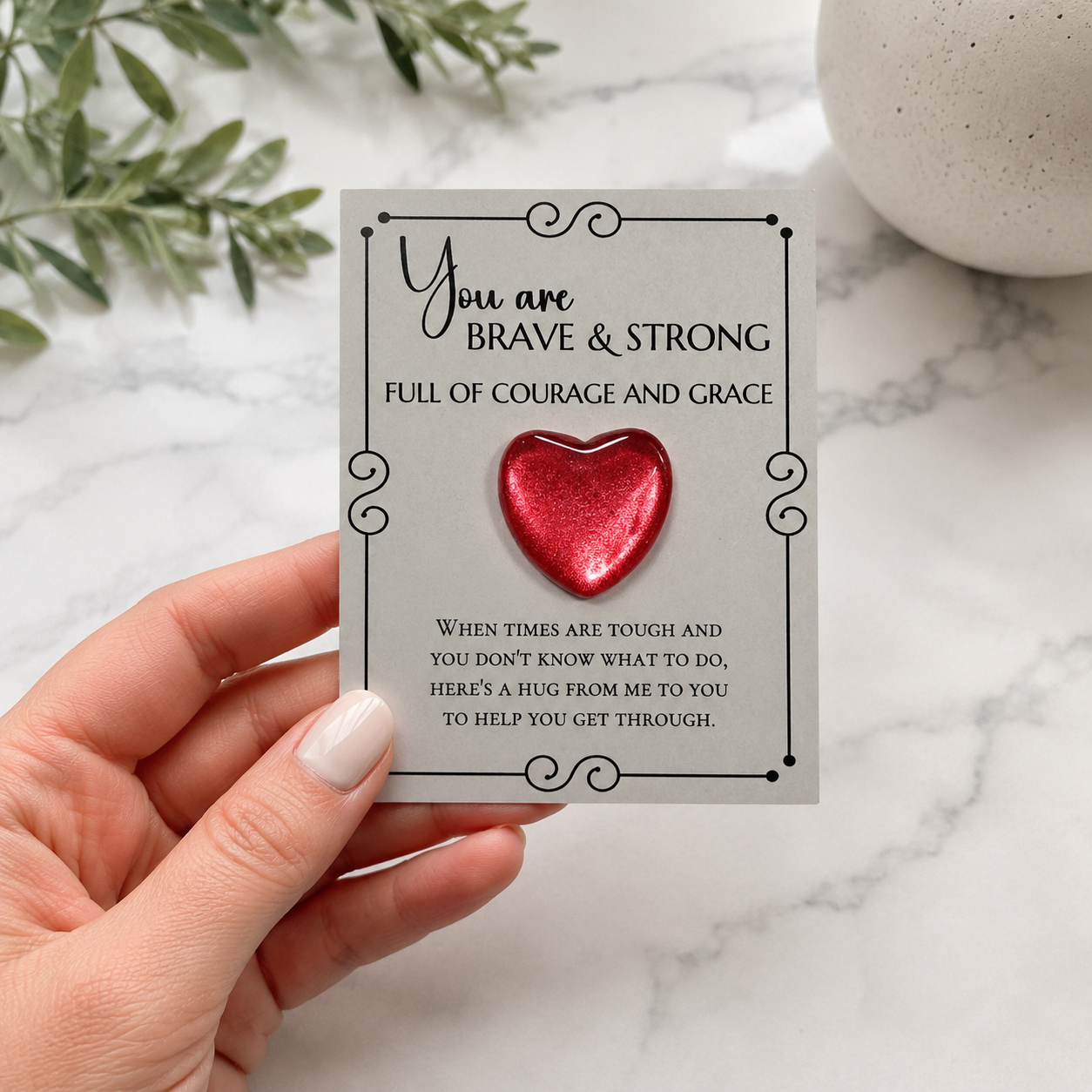 Inspirational pocket hug keepsake with a heart-shaped token on a "You Are Brave & Strong" encouragement card, a thoughtful comfort gift for friends, family, coworkers, or anyone needing support. Red